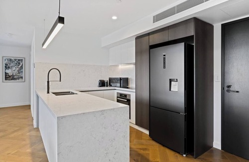 Hobart Central Business District Apartment | Sleek City Pad with a Garden Rooftop