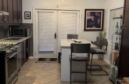 Regal Heights House | Small cozy room with bathroom on main floor