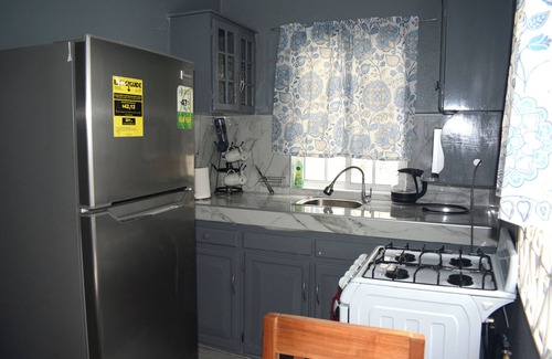 Portmore Apartment | Snuggled Oasis Studio.