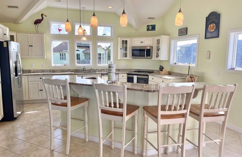 Ocracoke House | Solitude: Lavish, amenity filled! Relax in the pool, hot tub, theater
