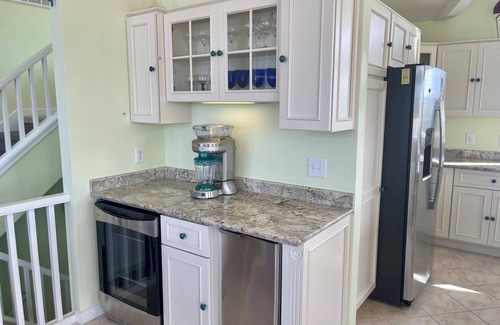 Ocracoke House | Solitude: Lavish, amenity filled! Relax in the pool, hot tub, theater