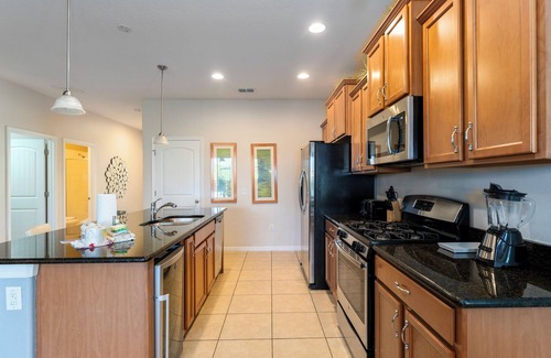 Loughman House | Solterra Sunshine Villa townhome with private pool in a resort setting.