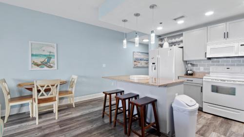 Panama City Beach House | Some Beach Some Where at Laketown Wharf #825 by Nautical Properties