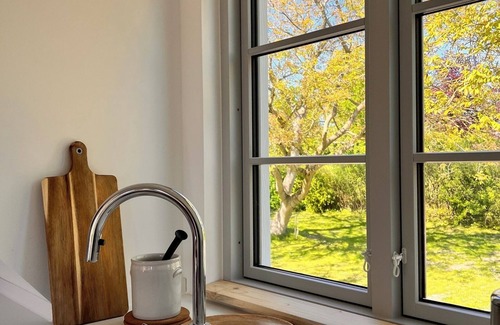 Brodersby Apartment | Sommerby Sky - close to the beach, shower, desk, DG, garden, e-charging station