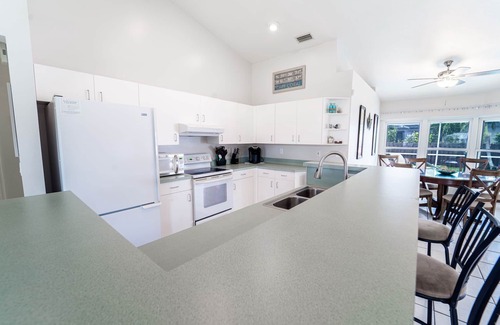 Pelican House | Sought after SW Cape Coral in beautiful waterfront neighborhood