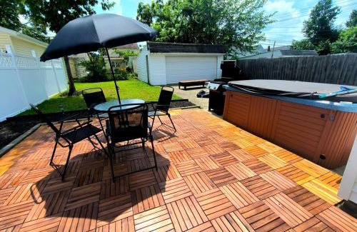 South Euclid House | South Euclid 4BR Luxe Escape with Hot Tub and BBQ