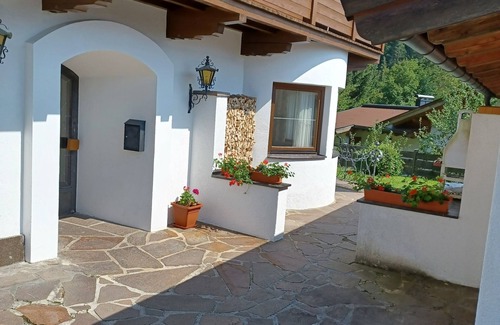 Scheffau am Wilden Kaiser Apartment | Spacious vacation apartment with fireplace + children's play corner, 10 + 2 persons