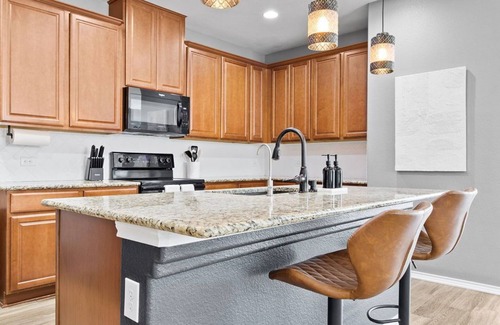 Hutto House | Spacious 4-bedroom Round Rock home with an open floor plan, Smart TVs in every room, and high-speed internet. Pet-friendly and conveniently close to Kalahari Resort and Dell Diamond, this modern yet cozy retreat is perfect for families & long stays.