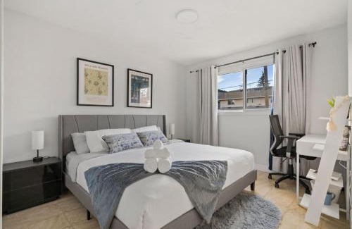 Montgomery House | Spacious 4-Bedroom Retreat Near Bow River with Foosball, Dart Board, Movie Room