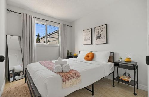 Montgomery House | Spacious 4-Bedroom Retreat Near Bow River with Foosball, Dart Board, Movie Room