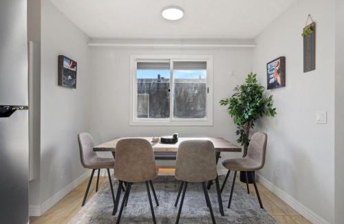 Montgomery House | Spacious 4-Bedroom Retreat Near Bow River with Foosball, Dart Board, Movie Room