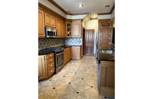 Downtown Omaha House | Spacious 4-Bedroom Townhome in the Blackstone