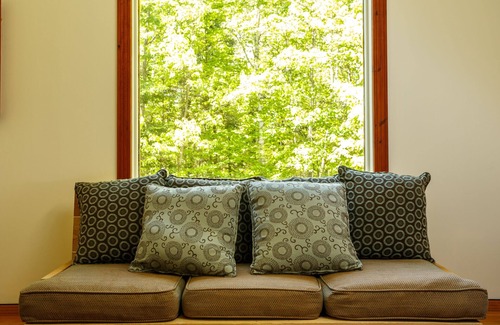 Lac Superieur Village Cabin | Spacious 6 person chalet w/ indoor fireplace, and private hot tub & sauna