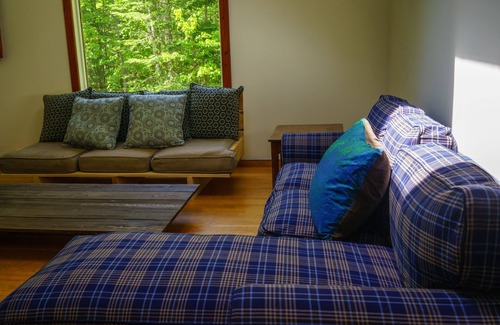 Lac Superieur Village Cabin | Spacious 6 person chalet w/ indoor fireplace, and private hot tub & sauna