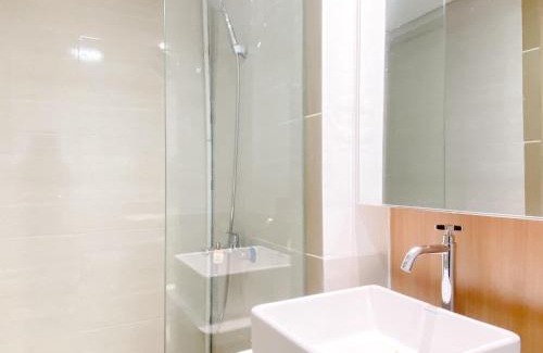 Cikarang Apartment | Spacious and Homey 2BR with Work Space at Meikarta Apartment By Travelio