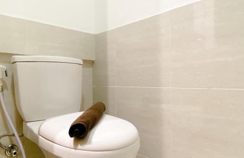 Cikarang Apartment | Spacious and Homey 2BR with Work Space at Meikarta Apartment By Travelio