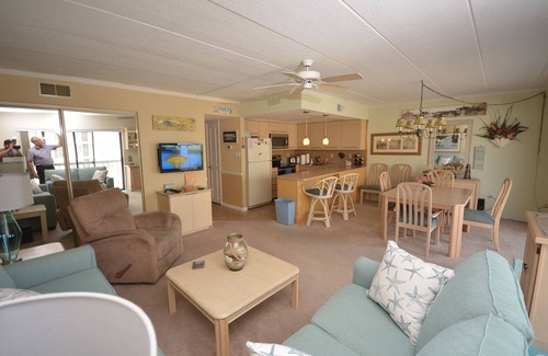 North Ocean City Condo | Spacious and stylish 2 bedroom condo with attractive furniture and downstairs storage locker located uptown on the ocean block just a short walk to the beach!