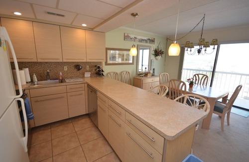 North Ocean City Condo | Spacious and stylish 2 bedroom condo with attractive furniture and downstairs storage locker located uptown on the ocean block just a short walk to the beach!