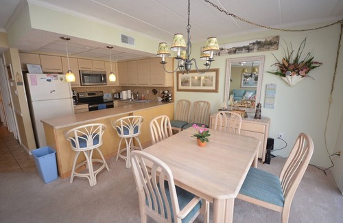 North Ocean City Condo | Spacious and stylish 2 bedroom condo with attractive furniture and downstairs storage locker located uptown on the ocean block just a short walk to the beach!
