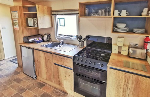 Ludchurch Apartment | Spacious and well presented 12ft wide caravan with one double and two twin.