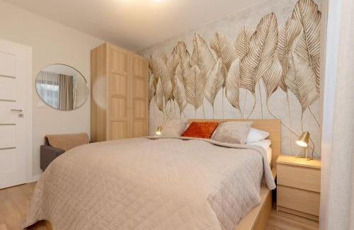 Gorce Apartment | Spacious Apartment in Warsaw with Balcony and Parking by Noclegi Renters