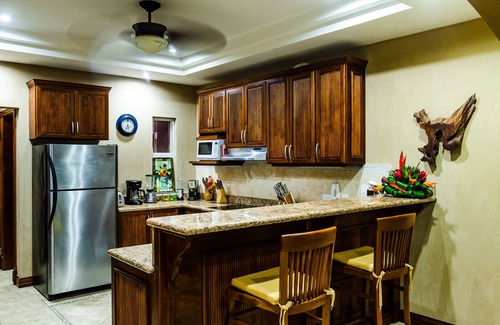 Playa Langosta Condo | Spacious beachfront 2-BR condo with Pool and a stunning sunset view