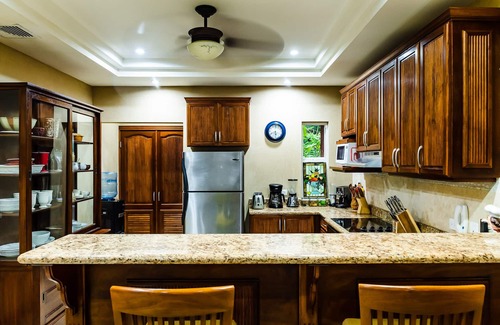 Playa Langosta Condo | Spacious beachfront 2-BR condo with Pool and a stunning sunset view