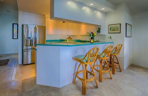 Orange Grove Condo | Spacious BEACHFRONT Condo with STUNNING Buck Island & Sea Views.