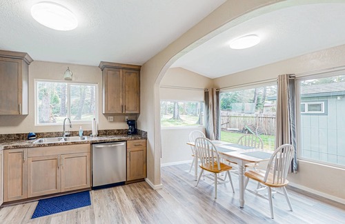 Coos Bay House | Spacious coastal property with separate living quarters, wood stove, & grill