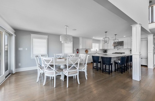 Avalon House | Spacious deck has ocean views as home is across the street from the beachblock.
