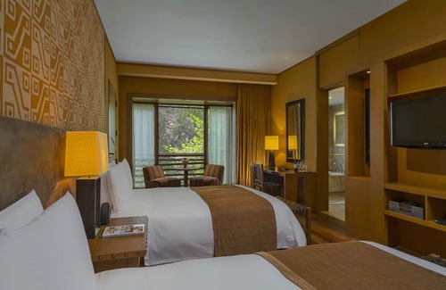Maras Hotel | Spacious Deluxe 2 Queen Room w/Balcony | Free Parking | Onsite Pools & Spa