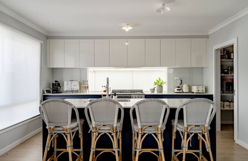 St Leonards Apartment | Spacious Hamptons-style home with heated pool