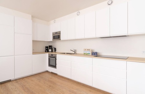 Nes House | Spacious holiday home in Nes with garden