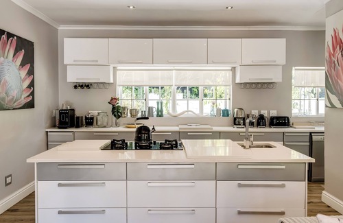 Hout Bay House | Spacious Home & Gardens with Pool Firepit & Mountain Views
