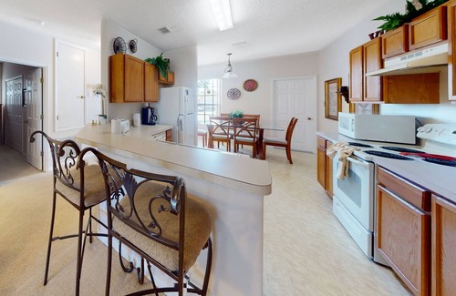 Sunset Ridge House | Spacious home with heated pool, foosball, pool table, washer/dryer, & central AC