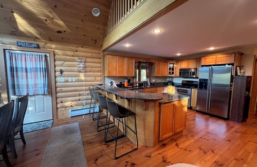 East Wakefield House | Spacious Lakefront Log Home for Family Fun & Relaxation- deck, firepit, gameroom