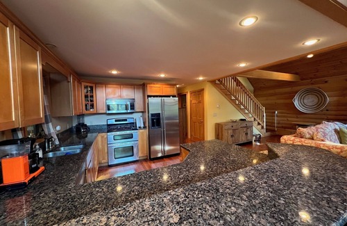 East Wakefield House | Spacious Lakefront Log Home for Family Fun & Relaxation- deck, firepit, gameroom