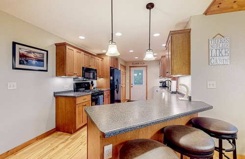 Manitowish Waters House | Spacious & peaceful lakefront villa with fire pit, patio, grill, & amazing views