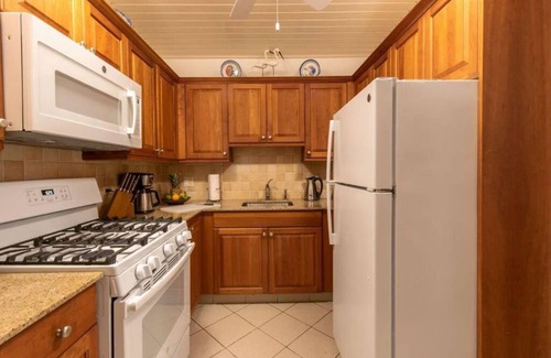 West End Village Hotel | Spacious Room w/Living Area and Full Kitchen | Steps Away from the Beach