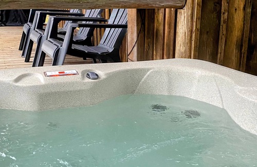 Weslemkoon Cabin | Spacious Rustic Cabin with Pond Views, Lake Access, Hot Tub and Dog-Friendly!