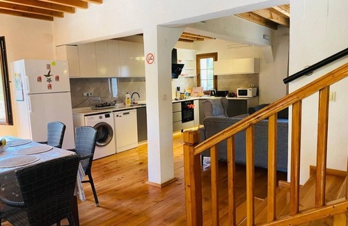 Fethiye City Center Villa | Spacious Stone Villa in the heart of Kayakoy, Overlooking the historic ruins.
