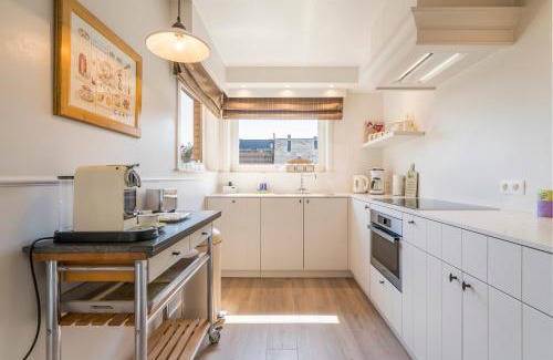 Bredene Apartment | Spacious, warm and updated Home w parking & garden