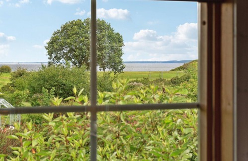Floutrup House | Spend a wonderful time in the vacation home with a view of the Limfjord.