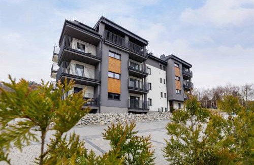 Wisla Apartment | Spokojna Cozy Apartment with Patio & Parking in Wisła by Noclegi Renters