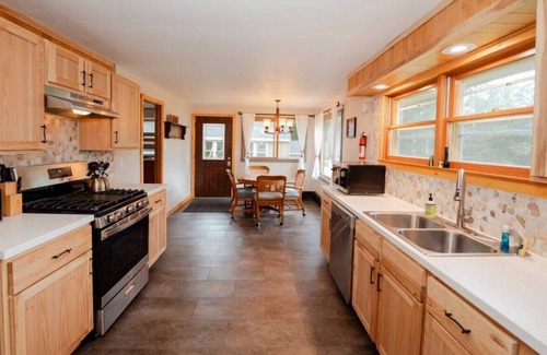 Lake Tomahawk Cabin | Sportsman's Paradise, Remodeled Riverfront Cabin