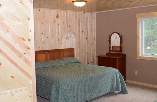 Park Rapids Resort | Spruce with two story high windows with loft on the premier lake of Big Sand