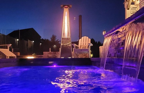 Palmer Condo | Staycation Oasis! A unique Experience!nnHeated salt water pool closing 10/31/25!