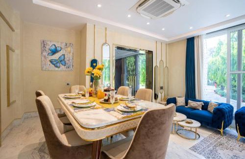 New Delhi Villa | StayVista at Estate 10 by Tarika - Luxury 4BR with Outdoor Pool and Lawn, ideal of events in Delhi