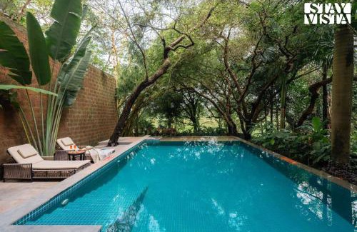 Moira Villa | StayVista at Moira by the River with Bonfire, BBQ
