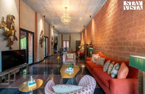Moira Villa | StayVista at Moira by the River with Bonfire, BBQ